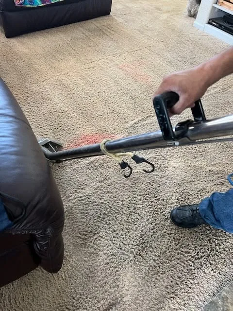 Carpet repair tools in use on a floor